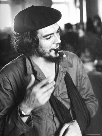 Cuban Rebel Ernesto Che Guevara, Left Arm in a Sling, Talking with Unseen Person