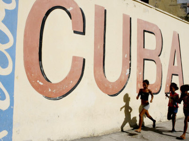 Cuban Girls Run in a Street in Havana, Cuba, Thursday, August 10, 2006