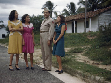 Cuban Who Served with U.S. Army in World War II Poses with Neighbors