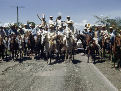 Wearing Cuban Flags, Men on Horseback Gather for a Political Meeting