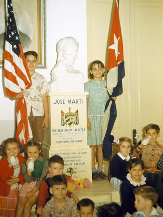 Cuban-American Students Pose Beside Bust of Cuban Patriot Jose Marti