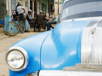 Vintage Car and Cuban Men Playing Domino Game on Marti Street